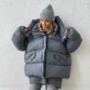 Pilka pūkinė striukė/liemenė Lola
