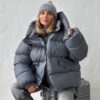 Pilka pūkinė striukė/liemenė Lola